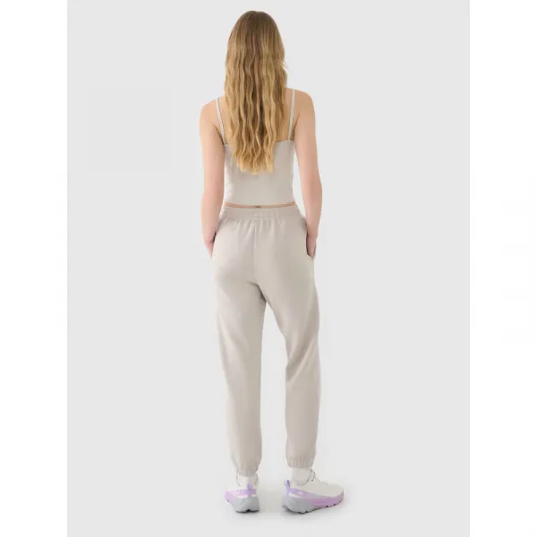 Dámske tepláky 4F TROUSERS CAS F1010-83S-BEIGE