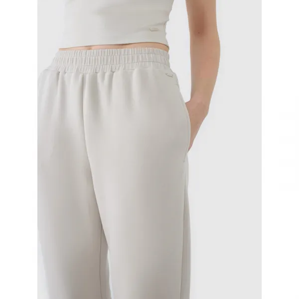 Dámske tepláky 4F TROUSERS CAS F1010-83S-BEIGE