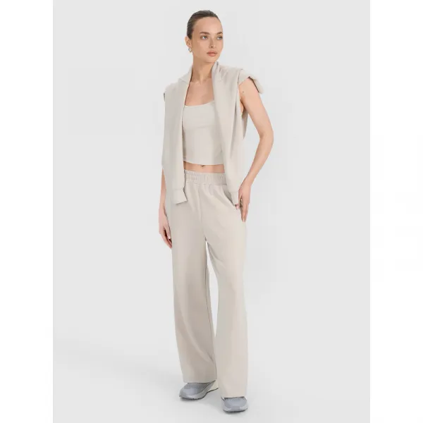 Dámske tepláky 4F TROUSERS CAS F1011-83S-BEIGE
