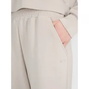 Dámske tepláky 4F TROUSERS CAS F1011-83S-BEIGE