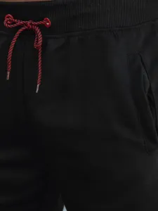 Očarujúce pánske teplákové nohavice čierne
