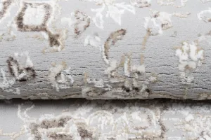 Svetlýbielo-sivýdizajnovývintagekoberecsovzormiŠírka:80cm|Dĺžka:150cm56590_115428