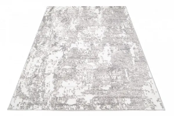 DizajnovýkoberecsabstraktnýmvzoromvkrémovejfarbeŠírka:140cm|Dĺžka:200cm56695_115565