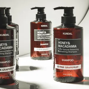 KUNDAL Honey & Macadamia Pink Grapefruit prírodný šampón pre suché a poškodené vlasy 500 ml