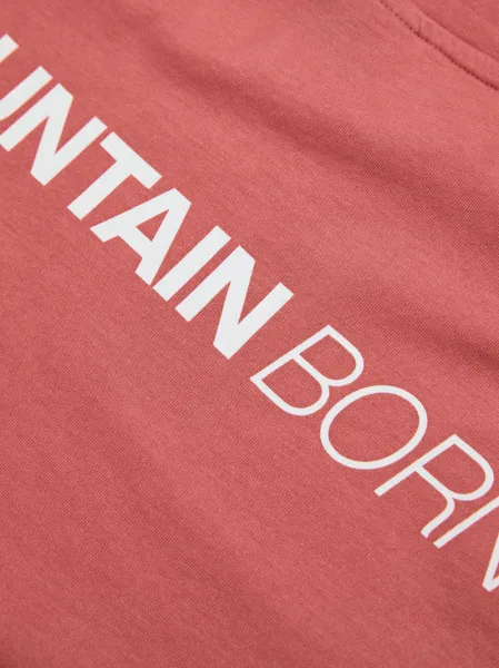 Tričko Peak Performance W Explore Graphic Tee Trek Pink