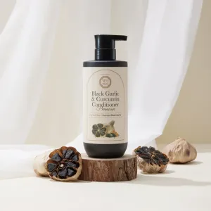 DAENG GI MEO RI Black Garlic & Curcumin Treatment ošetrujúci kondicionér pro hustotu vlasov a ochranu proti lámavosti 500 ml