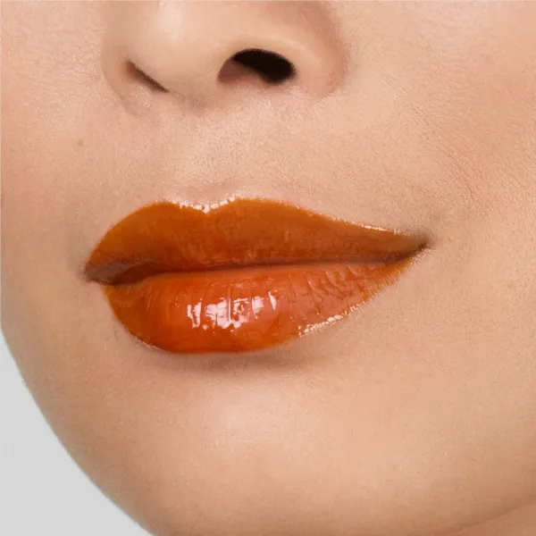 Estée Lauder Pure Color Melt Glosstick vysoko pigmentovaný lesk na pery v tyčinke odtieň Melted Tangerine 1.8 g