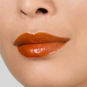 Estée Lauder Pure Color Melt Glosstick vysoko pigmentovaný lesk na pery v tyčinke odtieň Melted Tangerine 1.8 g