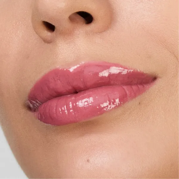 Estée Lauder Pure Color Melt Glosstick vysoko pigmentovaný lesk na pery v tyčinke odtieň Melted Melon 1.8 g