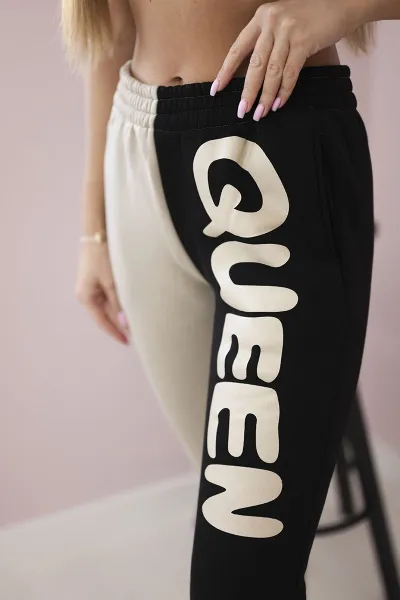 Kesi Dámske tepláky s nápisom QUEEN čierny