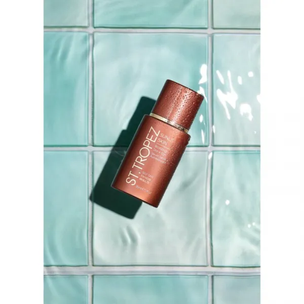 St.Tropez Sunlit Skin Bronzing Tint + Tan tónovací samoopaľovací krém na tvár 1 ks