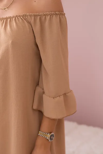Spanish blouse with ruffles on a camel sleeve