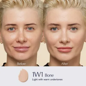 Estée Lauder Futurist SkinTint Serum Foundation With Botanical Oil Infusion SPF 20 ošetrujúci make-up SPF 20 odtieň 1W1 Bone 30 ml