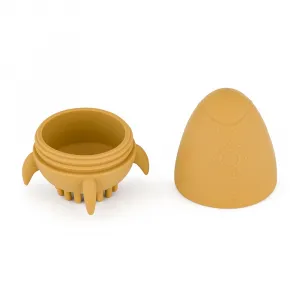 PETITE&MARS Hračka silikónová do vody s kefkou Splashy Rocket Intense Ochre 6m+