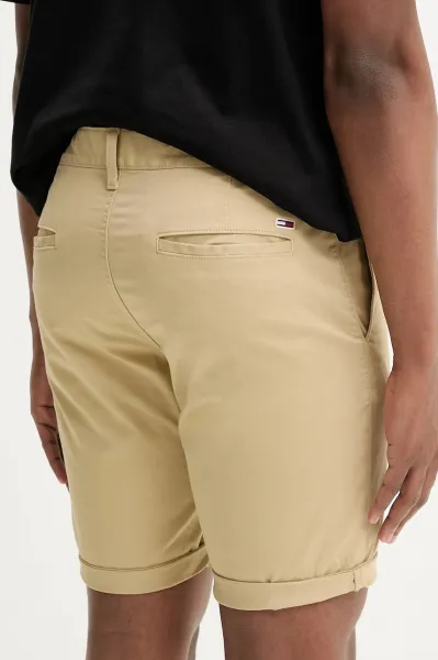 Šortky Tommy Jeans pánske, zelená farba, DM0DM21950