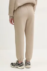 Tepláky Under Armour zelená farba, jednofarebné
