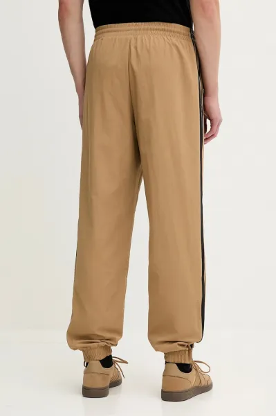 Tepláky adidas Originals Firebird Pants zelená farba, s nášivkou, JY1339