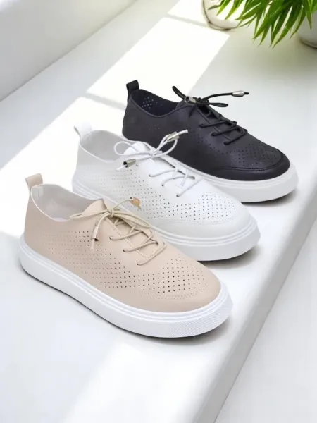 Resti Women's perforated laced sports shoes Vaned