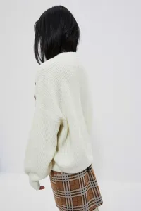 Women's sweater with decorative buttons