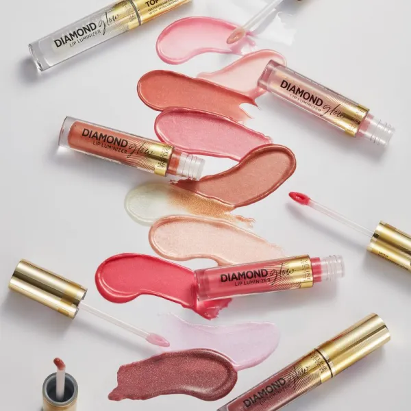 Eveline Cosmetics Diamond Glow trblietavý lesk na pery s kyselinou hyalurónovou odtieň 11 Rose Nude 4,5 ml