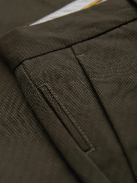 Elegantné pánske chinos nohavice tmavozelené