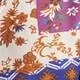 Dlhé šaty s výstrihom do V a patchwork potlačou