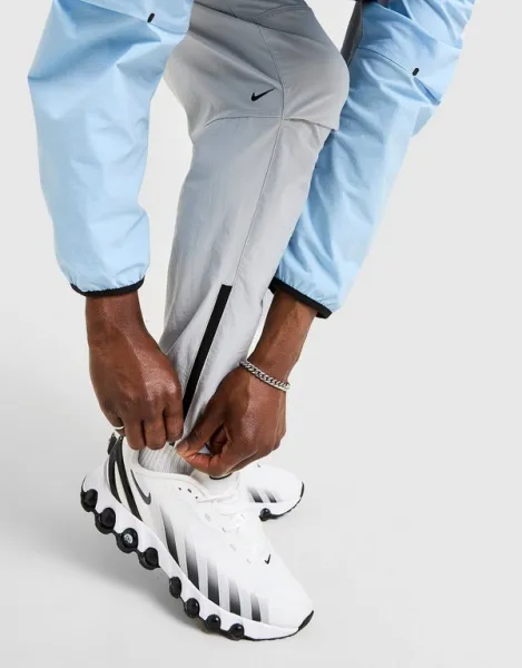 Nike Nohavice  M Nk Tch Wvn Oh Pant