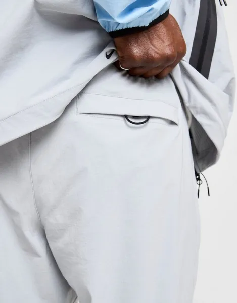 Nike Nohavice  M Nk Tch Wvn Oh Pant