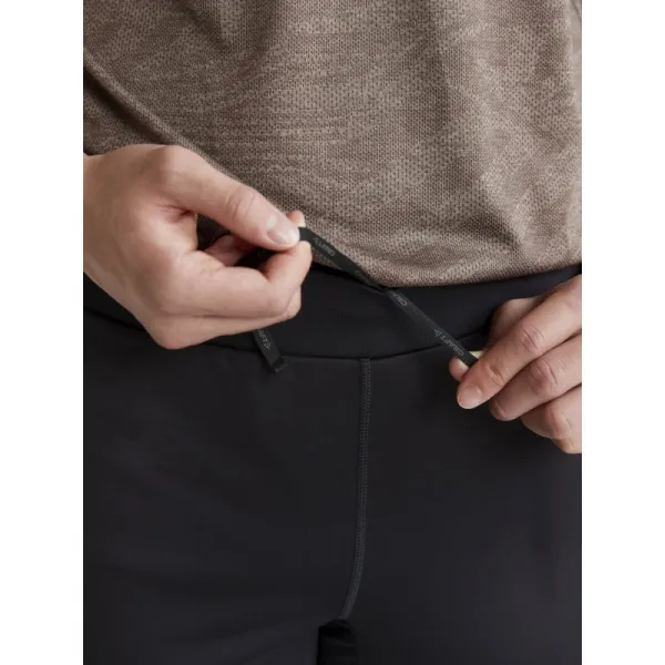Pánske bežecké nohavice CRAFT ADV ESSENCE WARM WIND TIGHTS 2 M-999000-Black