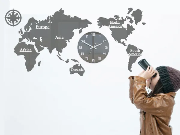 ModernClock Nástenné samolepiace hodiny Mapa sveta 110x55 cm sivé