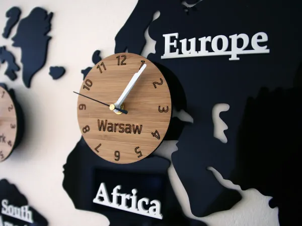 ModernClock Nástenné samolepiace hodiny Časové zóny 100x56 cm čierne/hnedé