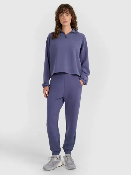 Dámske tepláky 4F TROUSERS CAS F1180-WAW25TTROF1180-32S-DENIM