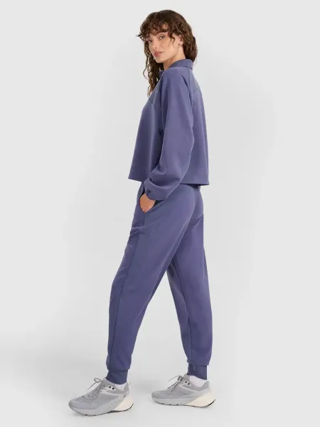 Dámske tepláky 4F TROUSERS CAS F1180-WAW25TTROF1180-32S-DENIM