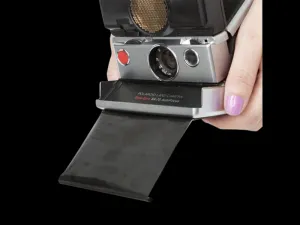 POLAROID FILM SHIELD FOR FOLDING TYPE