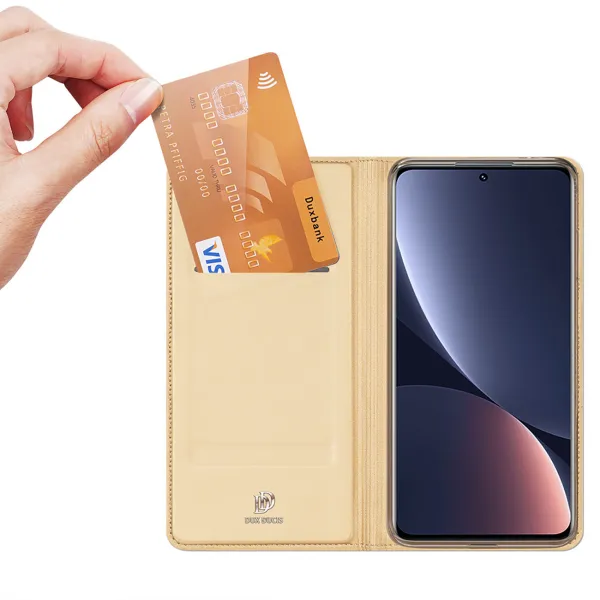 Dux Ducis Skin Pro knižkové kožené puzdro na Xiaomi 13 Pro, zlaté