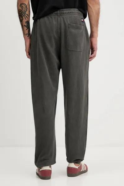 Bavlnené tepláky Tommy Jeans čierna farba, melanžové, DM0DM22360