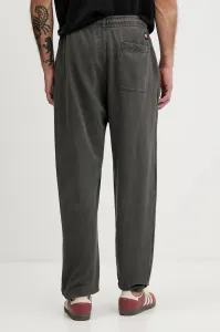 Bavlnené tepláky Tommy Jeans čierna farba, melanžové, DM0DM22360