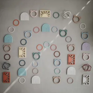 Mushie silikónové hryzatko Rainbow - Shifting Sand
