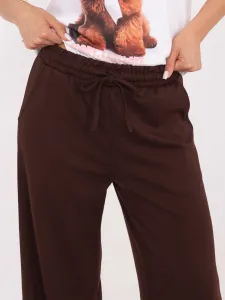 Dámske tepláky v tmavohnedej farbe