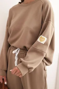 Legínovo Dámsky maslový komplet s voľnou mikinou a nohavicami s nápisom LOVE hnedý Farba: Tmavá camel, Veľkosť: UNI