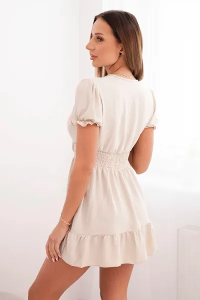 Dress with a tied V-neckline in beige
