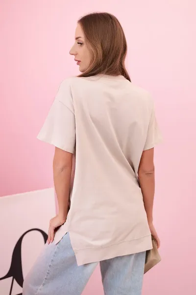 Kesi Dámske oversize bavlnené tričko srdcom a strapcami béžové