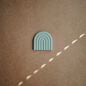 Mushie silikónové hryzatko Rainbow - Shifting Sand