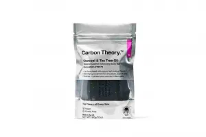 Carbon Theory Charcoal & Tea Tree Oil čistiaci telový peeling pre problematickú a mastnú pokožku 100 g