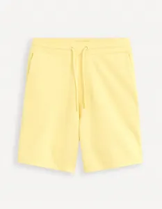 Žlté pánske teplákové kraťasy Celio Toshort