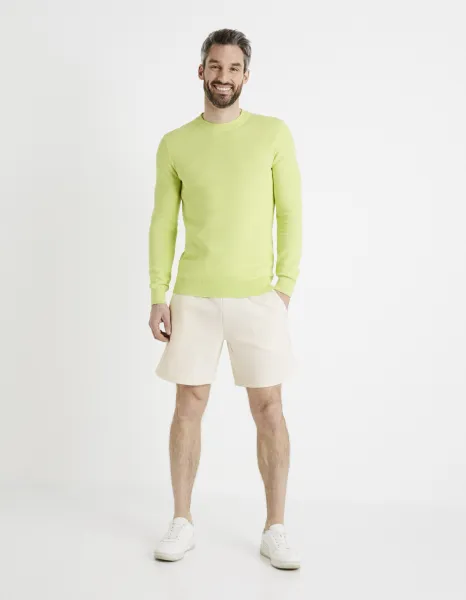 Krémové pánske teplákové kraťasy Celio Donewshort