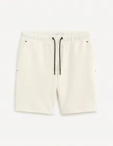 Krémové pánske teplákové kraťasy Celio Donewshort