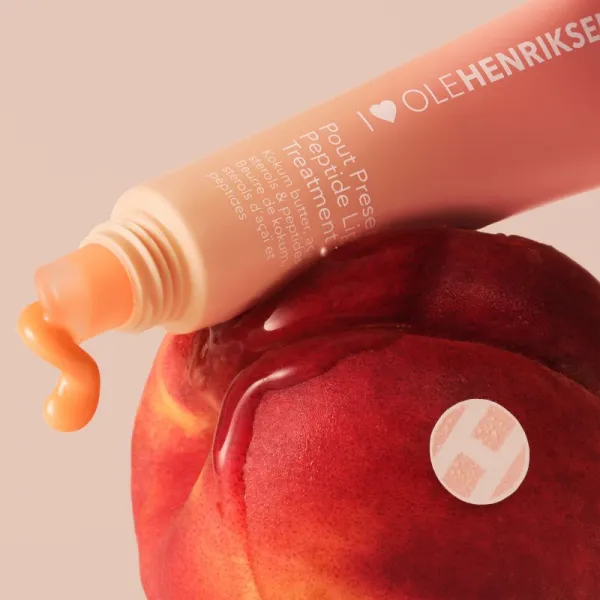 OLEHENRIKSEN Pout Preserve Peptide Lip Treatment hydratačný lesk na pery odtieň Peach Glaze 12 ml