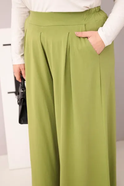 Kesi Włoski Dámske bavlnené nohavice Plus Size s širokou nohavicou a voľným strihom pistáciové