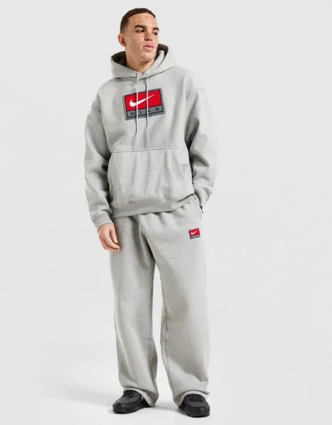 Nike Nohavice  M Nl Solo Swsh Bb Oh Pant Gfx